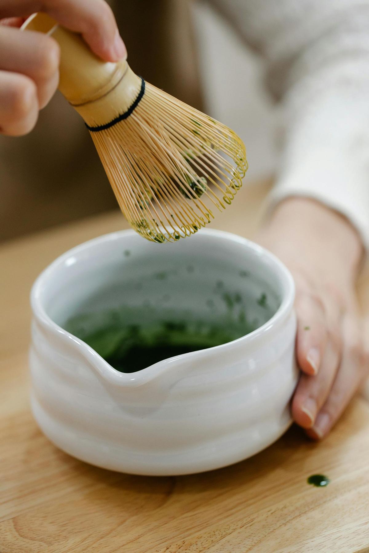 Whisking matcha in bowl